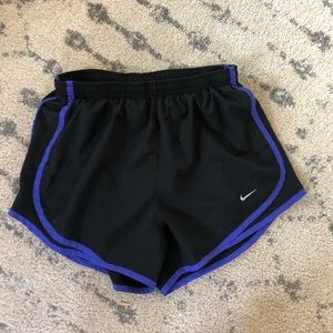 Black + blue Nike shorts